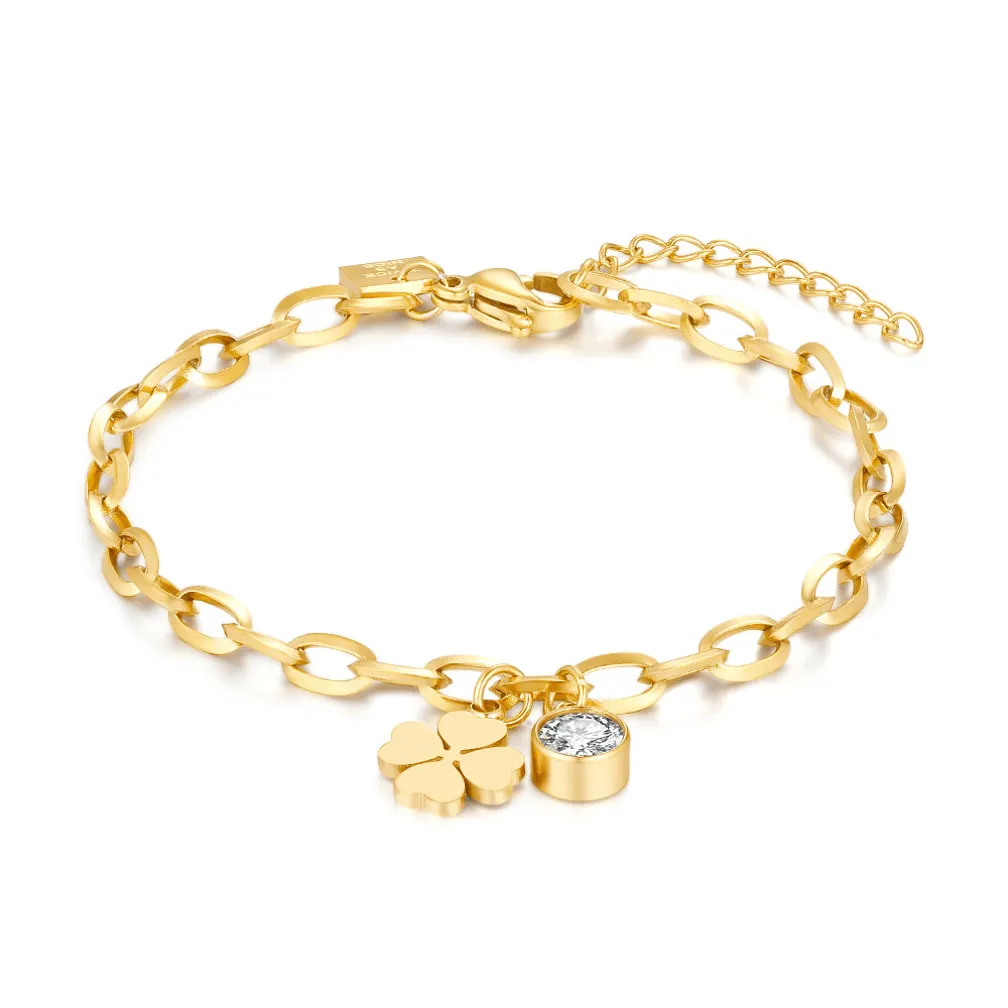 Armband in goudkleurig edelstaal, ovale schakels, klaver, 1 kristal