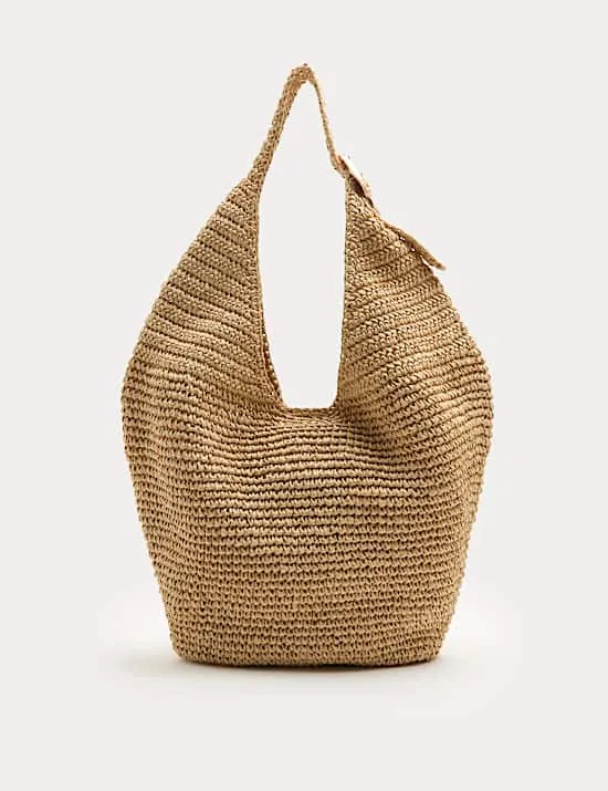 Schultertasche aus Stroh mit Metallbesatz