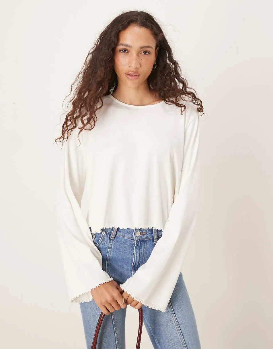 ASOS DESIGN lettuce hem long sleeve t-shirt in cream