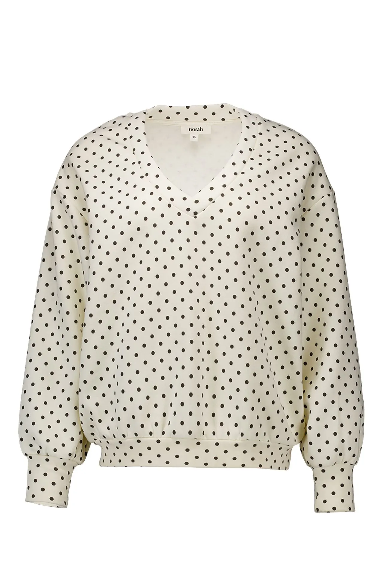 Ecru sweater met polkadots