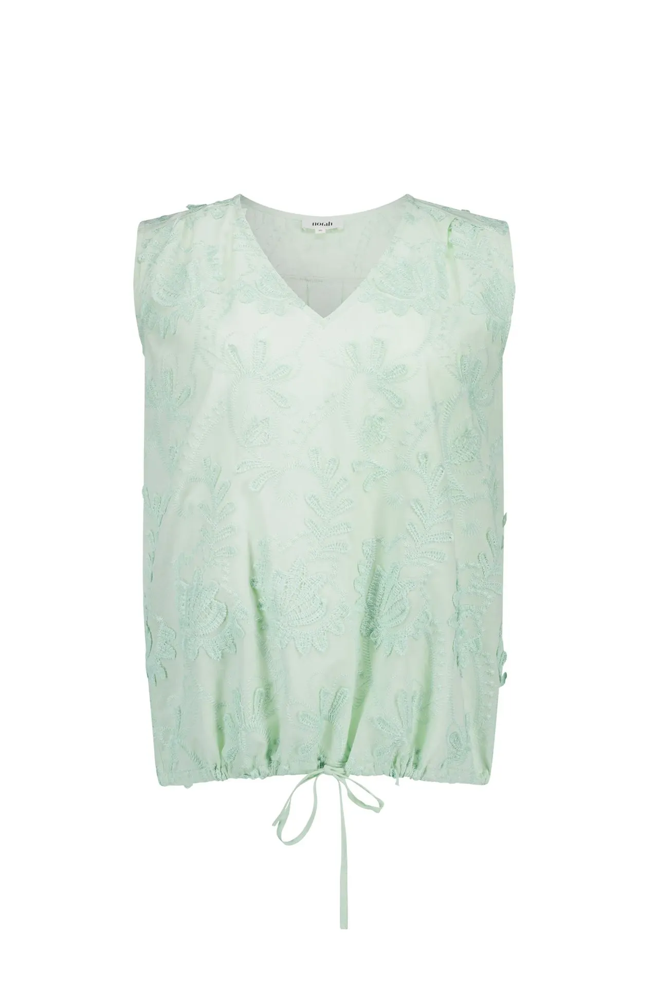 Groene top met borduursels