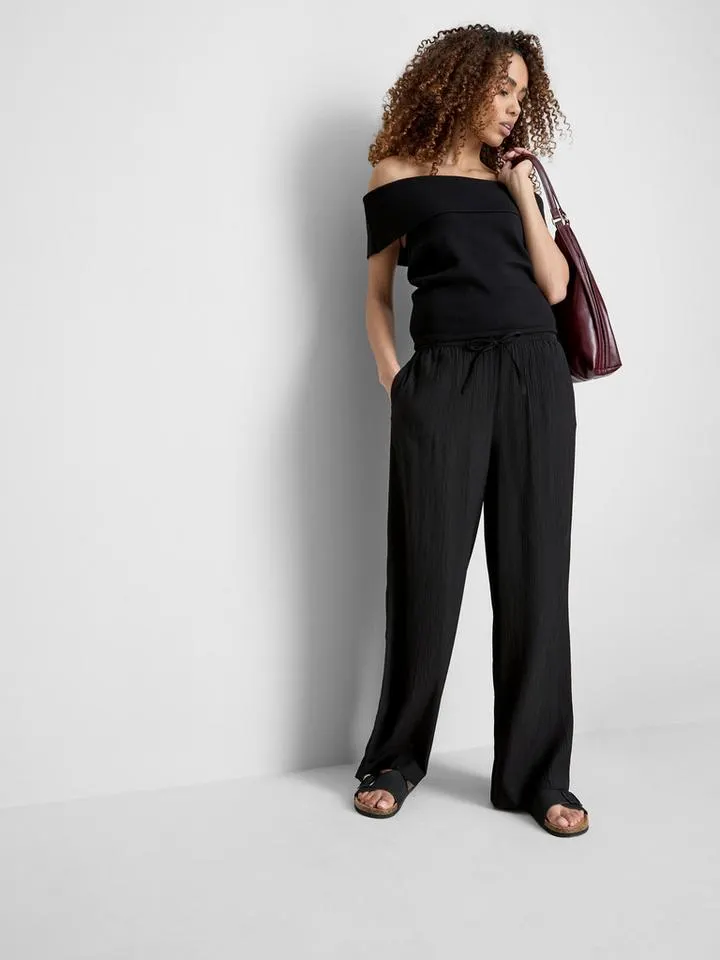 Pantaloni larghi increspati