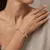Armband in edelstaal, met zirkonia