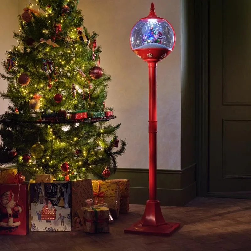 Kerstlantaarn met sneeuw, licht en geluid