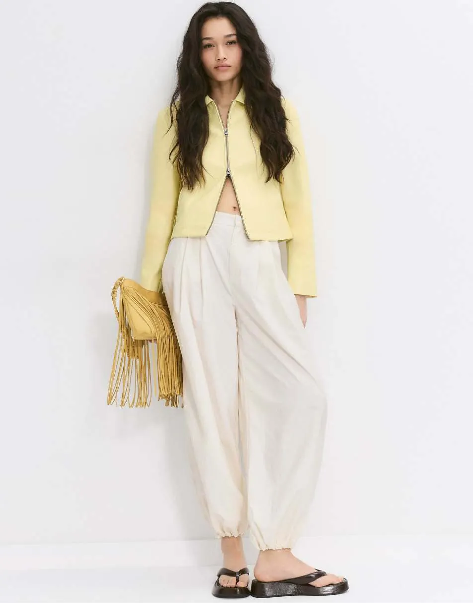 Stradivarius Fitted leather effect jacket in pastel yellow