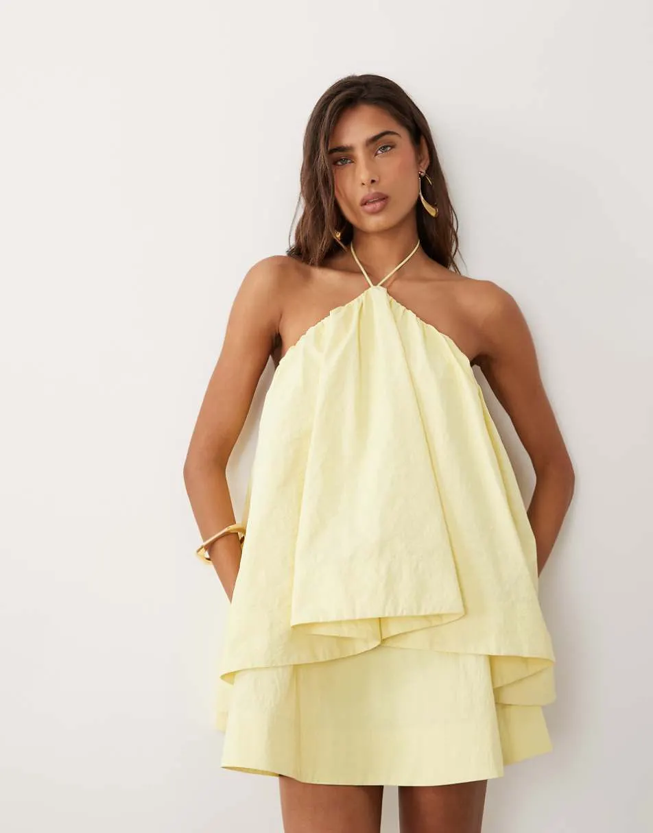 ASOS DESIGN halter neck trapeze mini dress in soft yellow