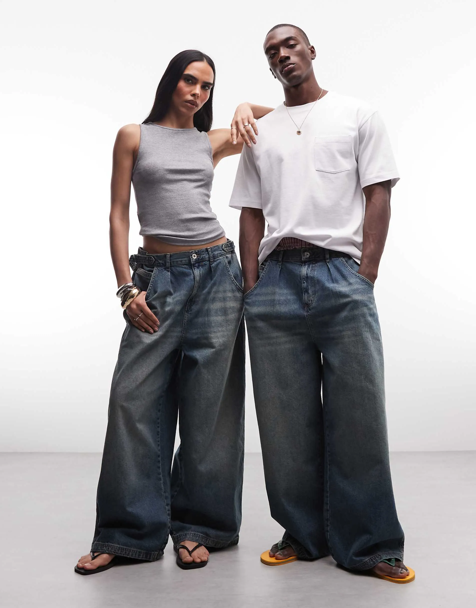 COLLUSION Unisex XL baggy jean in mid blue wash