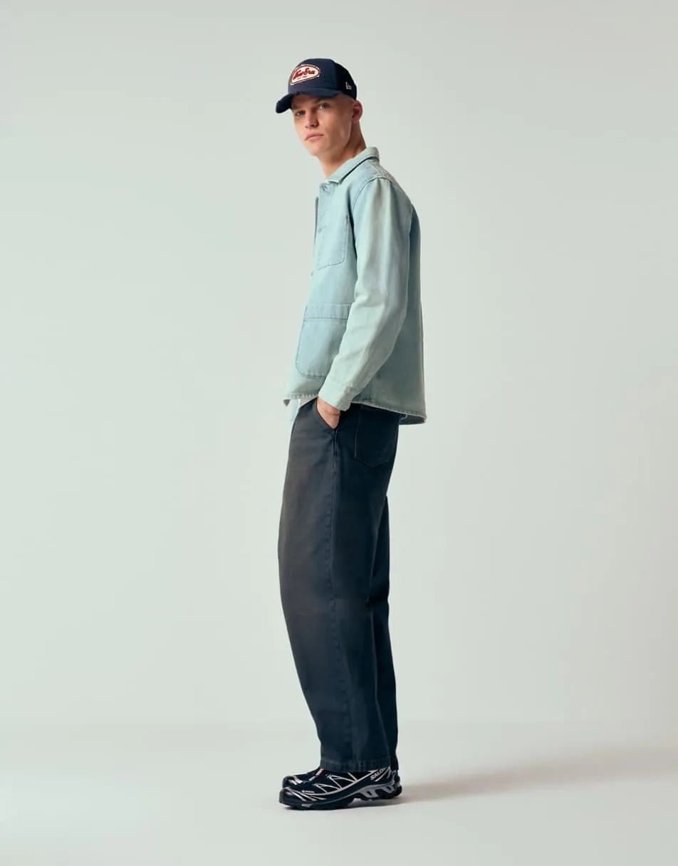 ASOS DESIGN relaxed tapered jeans in dark wash blue with pleats