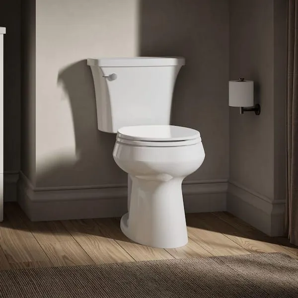 KOHLER Highline Arc 12 in.​ Rough In 2-​Piece 1.​28 GFP Single Flush Round Chair Height Toilet in White with Soft Close Seat