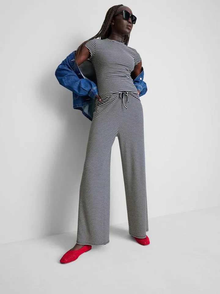Pantaloni larghi in cotone a coste e a righe