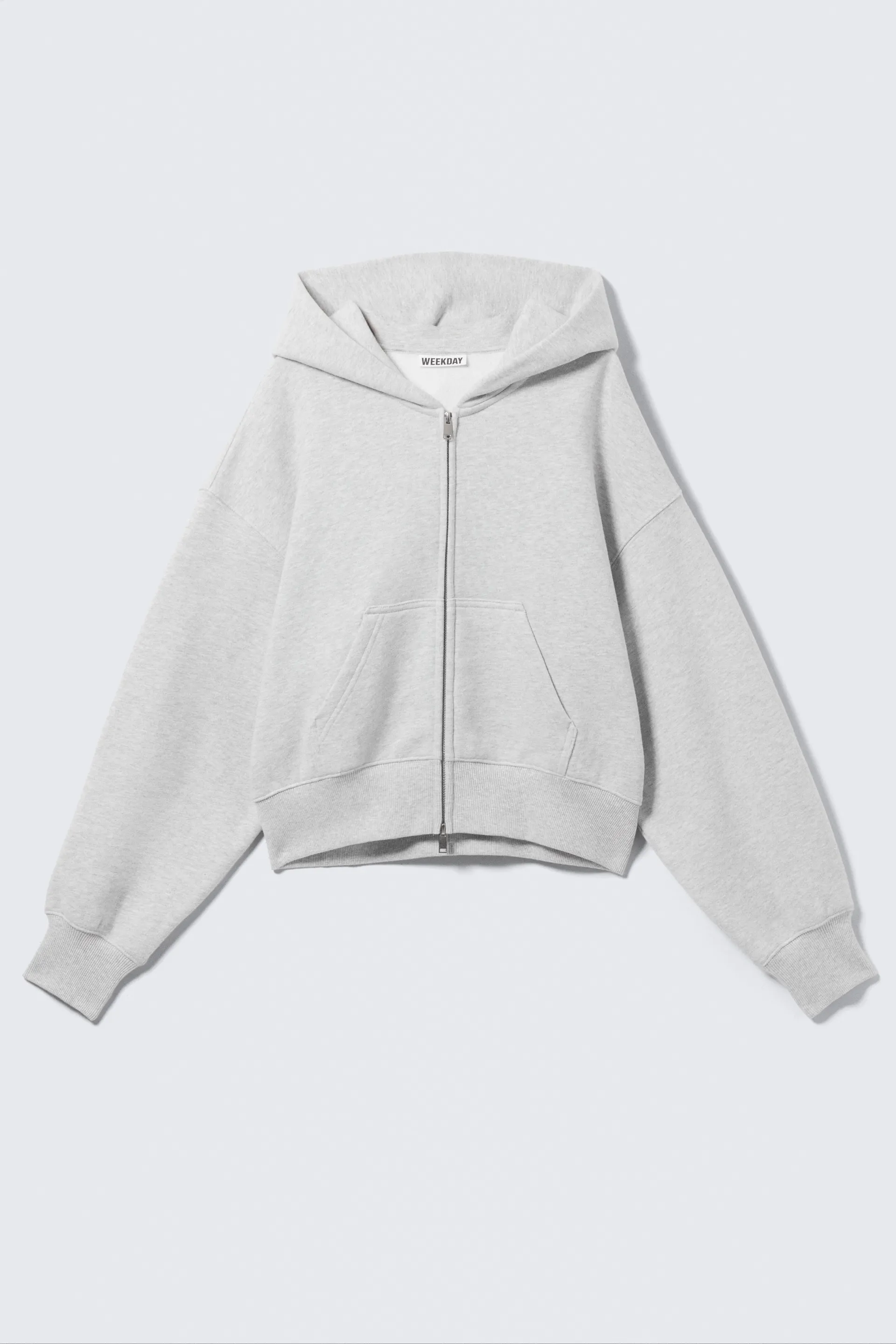 Kort, boksete hettegenser med glidelås