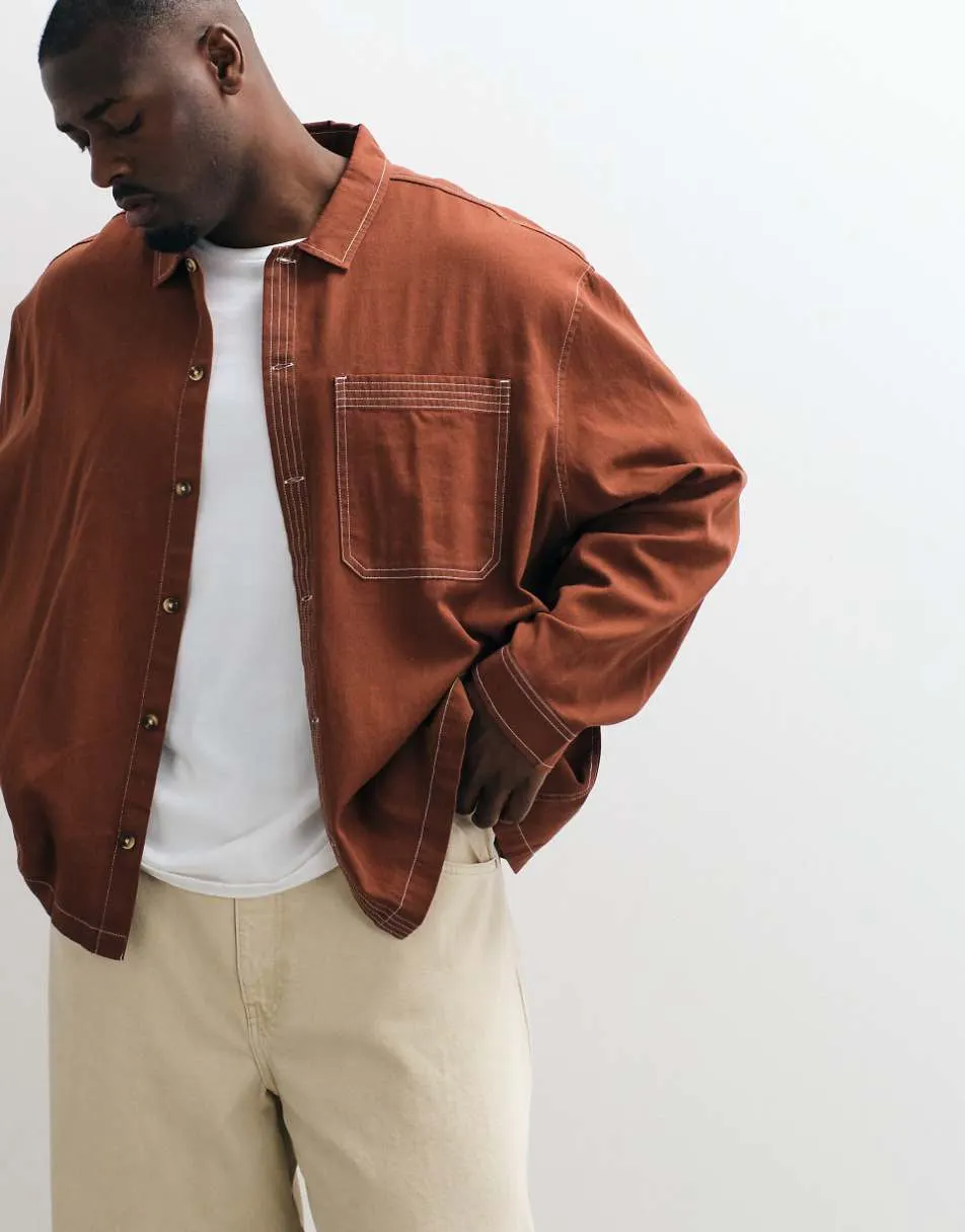 ASOS DESIGN boxy oversized cotton twill shirt with contrast stitch in rust