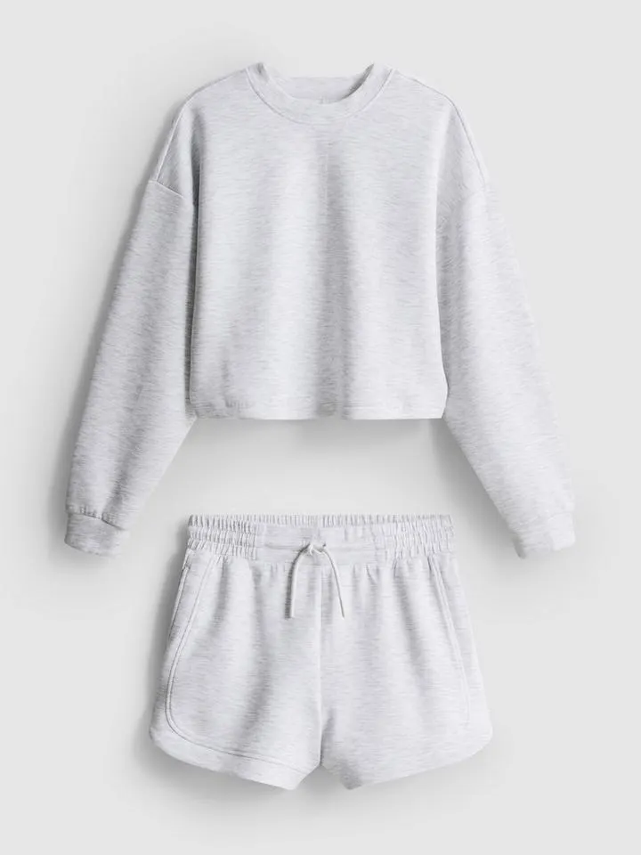 7–15 ans | Ensemble sweat-shirt et short de course