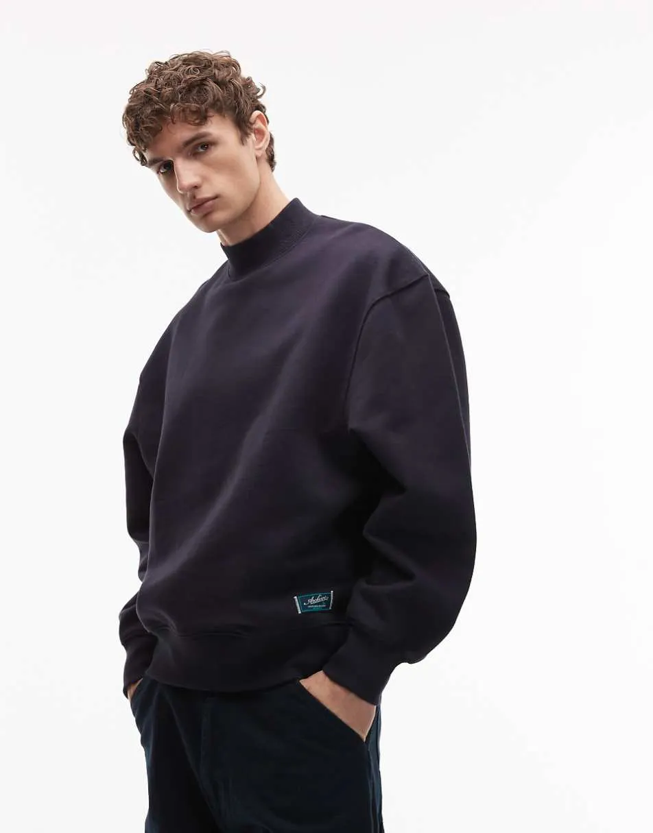 ASOS DESIGN oversized heavyweight 400gsm high neck sweatshirt with woven badge in navy