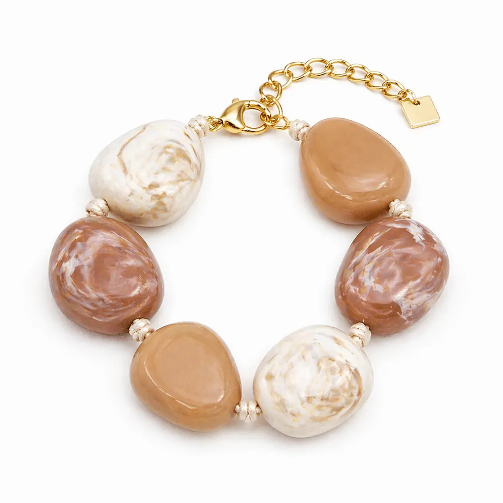 Armband in edelstaal met grote kralen in beige