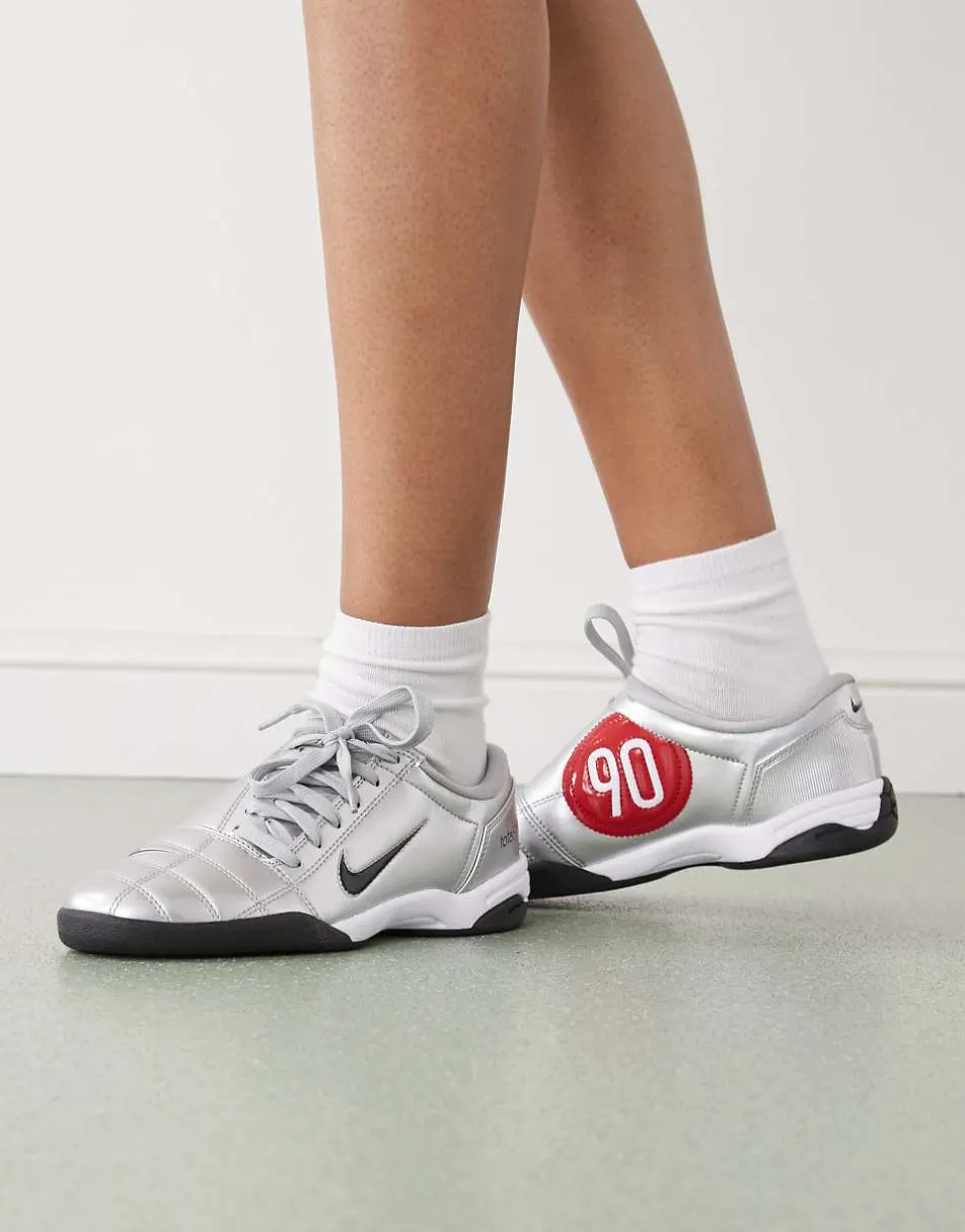 Nike T90 Metallic trainers in silver and red