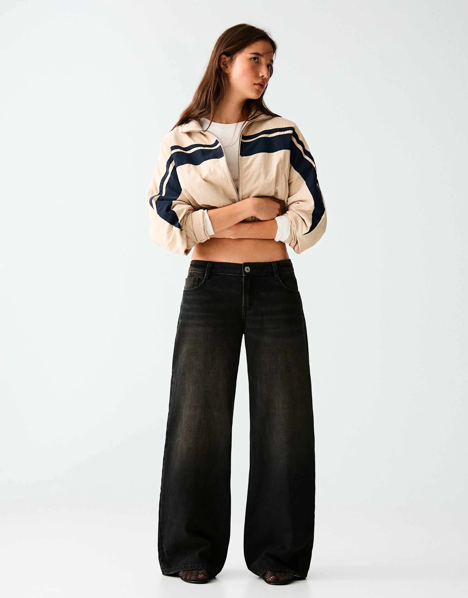 Bershka Petite low-rise wide-leg jeans in black