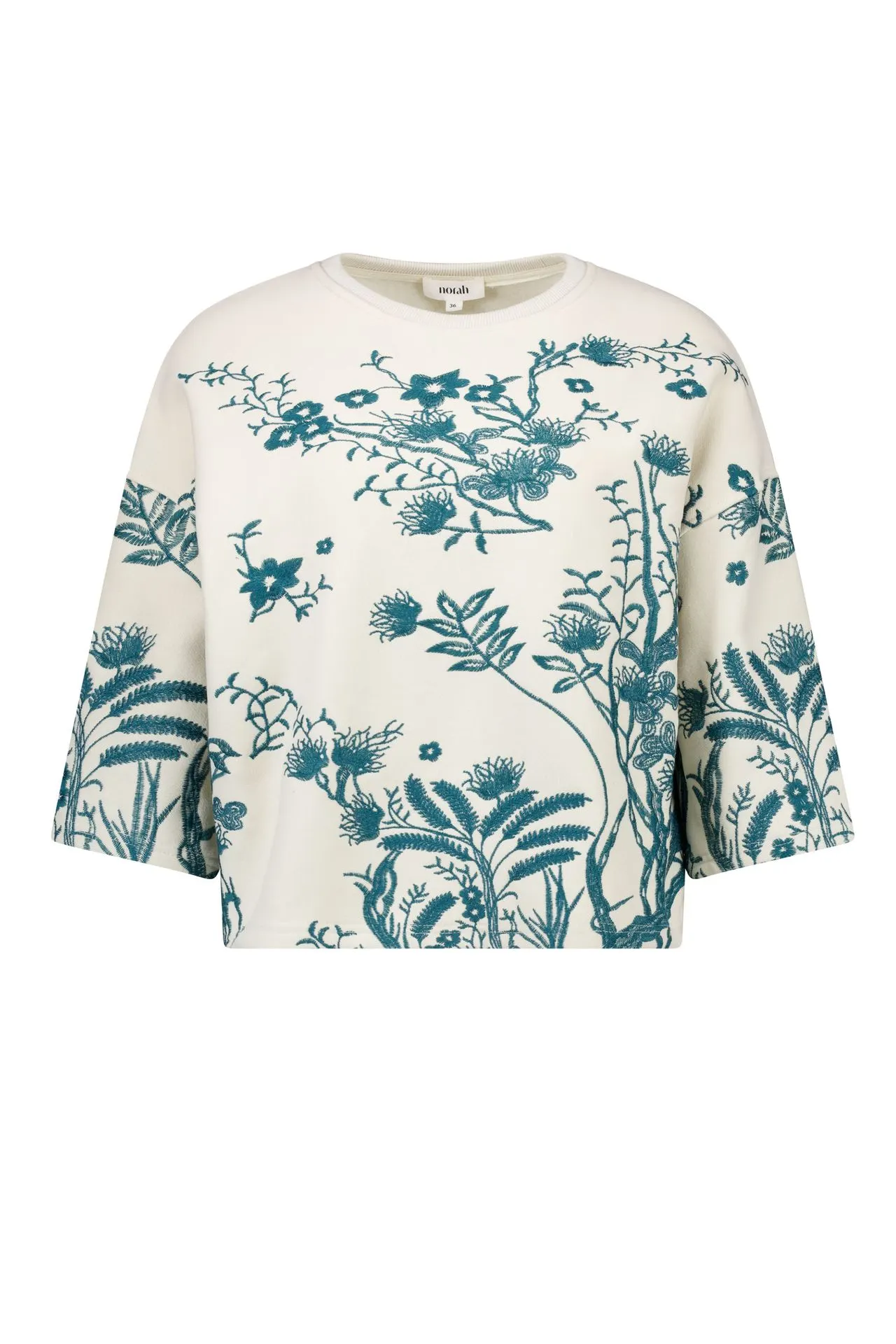 Ecru sweater met borduursels