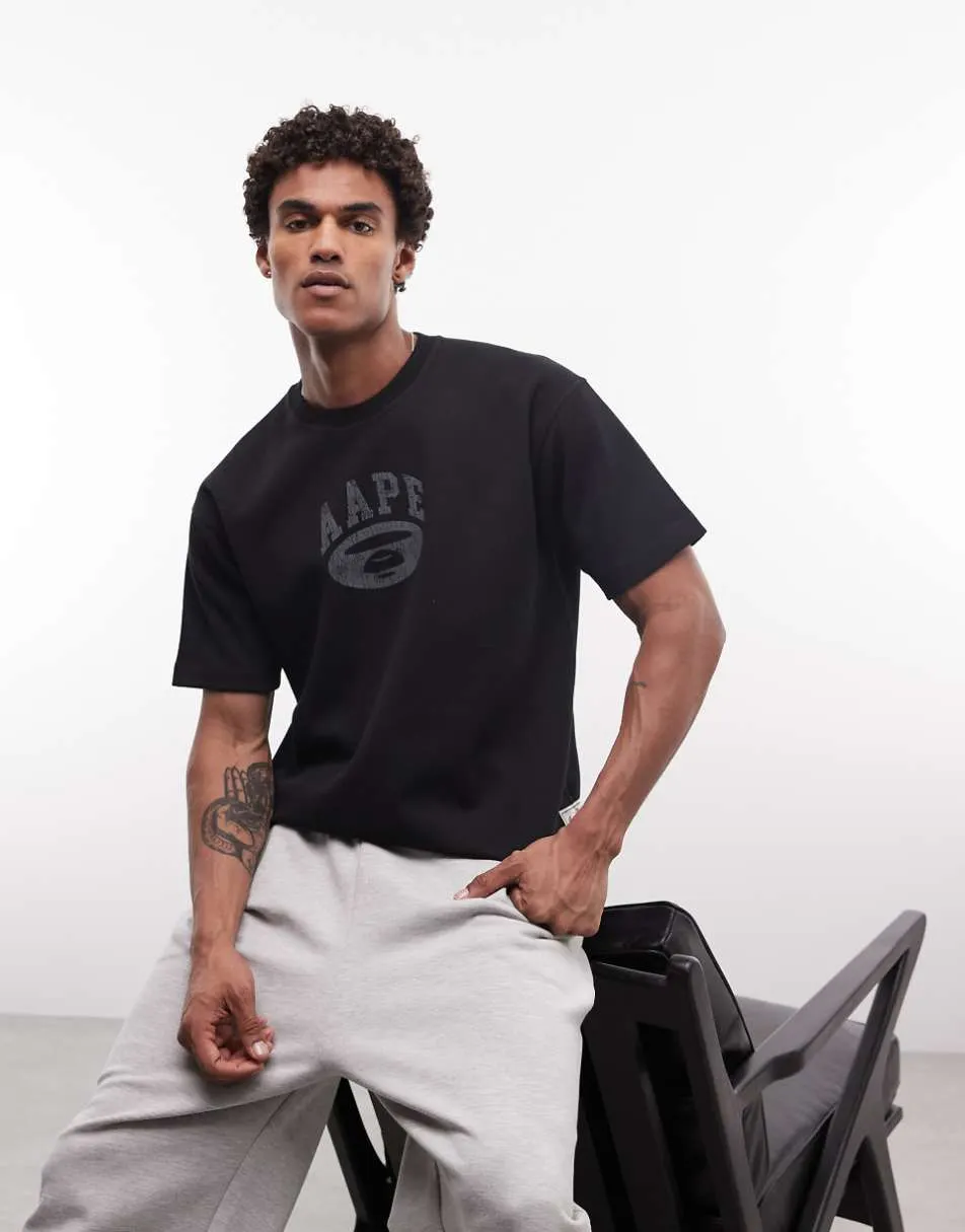 Aape by A Bathing Ape oversized reversible t-shirt in black and blue with multiple prints