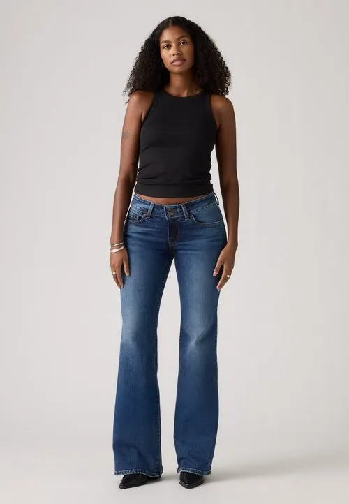 SUPERLOW FLARE - Flared jeans - healing power