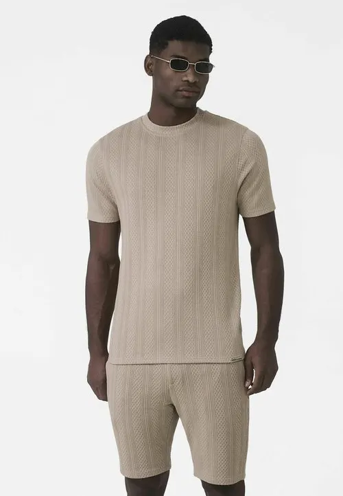 MAUVAIS - T-shirts med print - beige