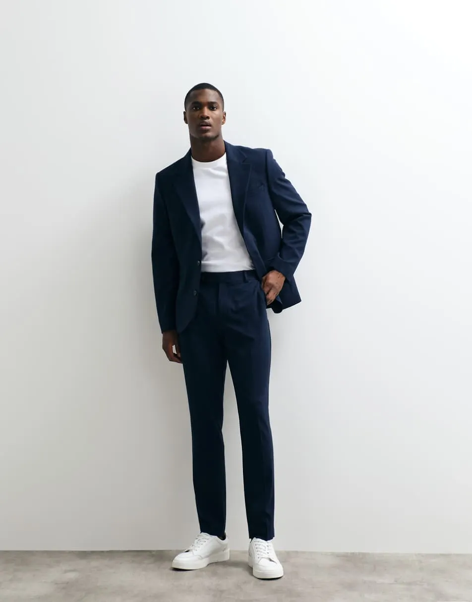 ASOS DESIGN flexMAX skinny suit trousers in navy