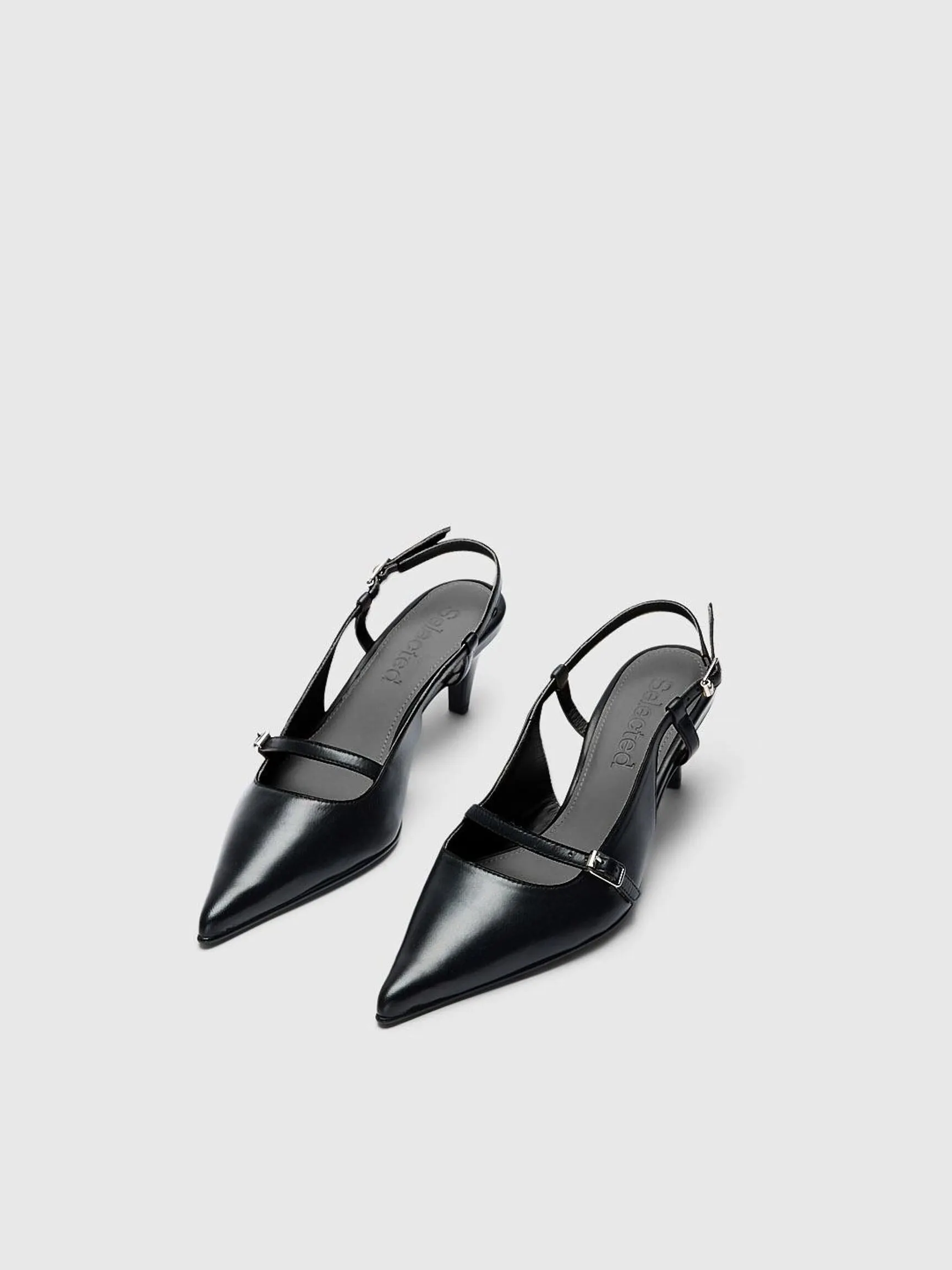 SKINN SLINGBACKS
