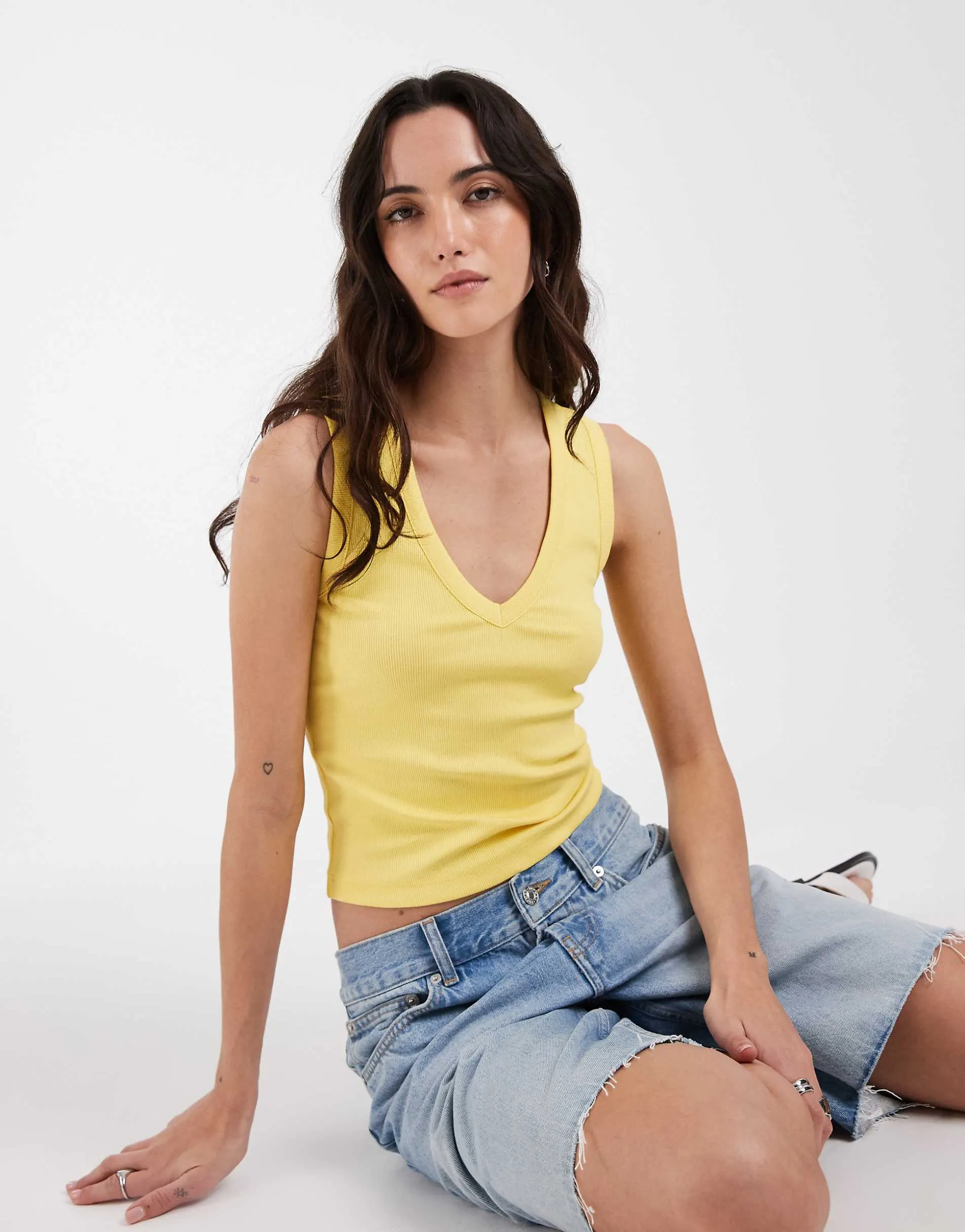 ASOS DESIGN ribbed v neck vest in yellow