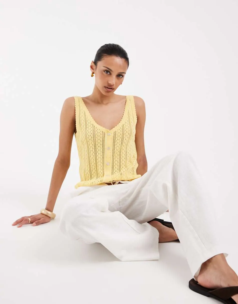Vero Moda pointelle knitted button front vest top in golden yellow