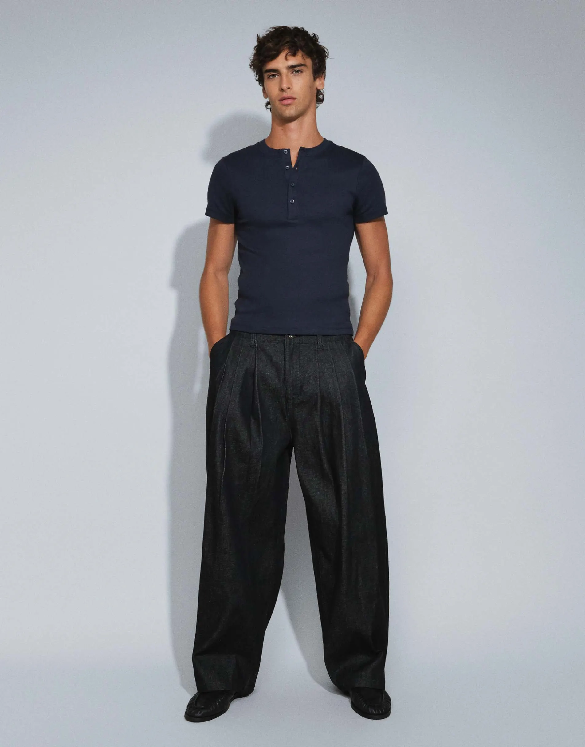ASOS DESIGN barrel jeans in raw black denim with pleats