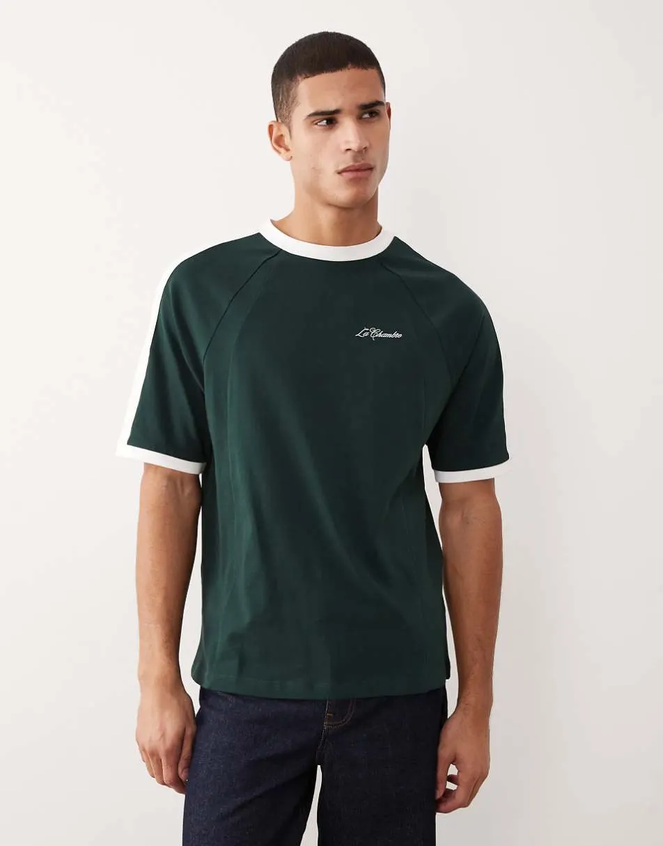 ASOS DESIGN heavyweight relaxed raglan t-shirt with panelling and social club graphic in dark green