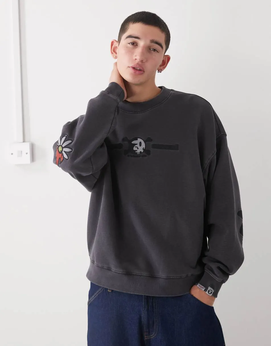 Aape by A Bathing Ape x Erased oversized sweatshirt in washed black
