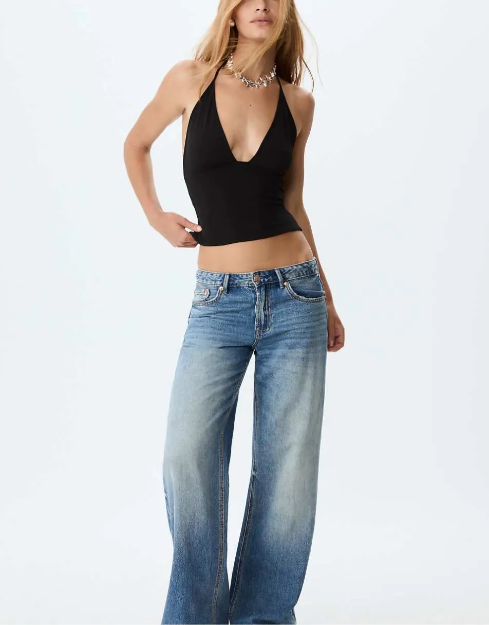 Stradivarius D91 low wide-leg jeans in medium denim wash