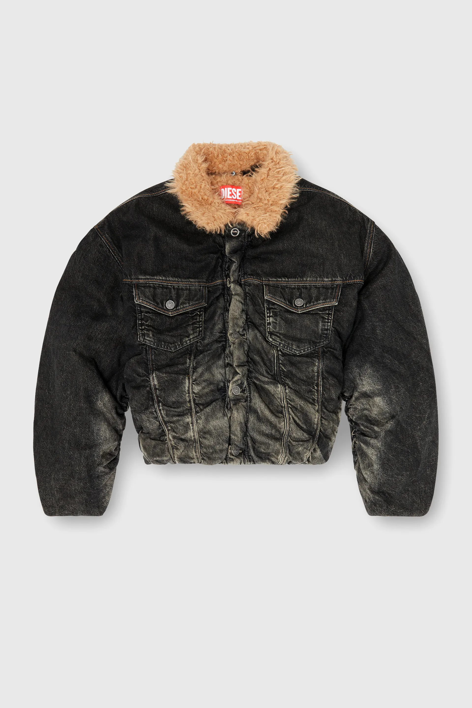 Teddy-lined trucker jacket in dirty-effect denim