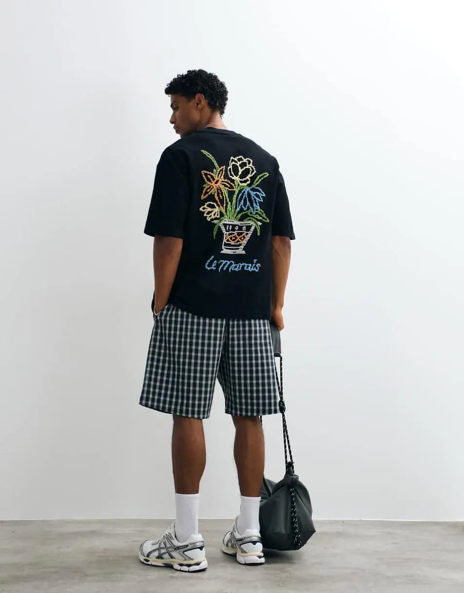 ASOS DESIGN heavyweight oversized t-shirt with floral puff print in black crepe fabric