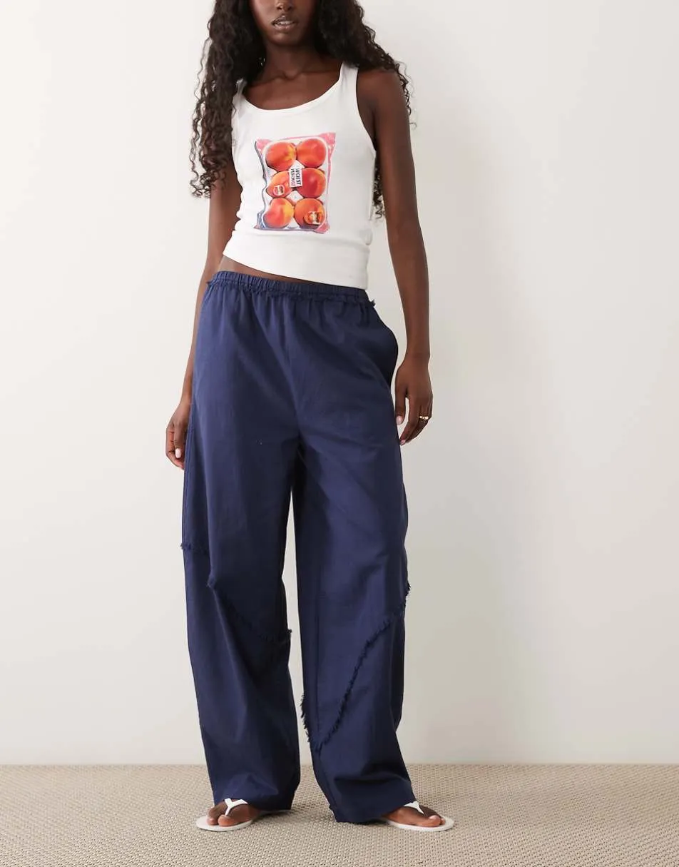 ASOS DESIGN linen blend pull on barrel leg trousers with raw seam detail in navy