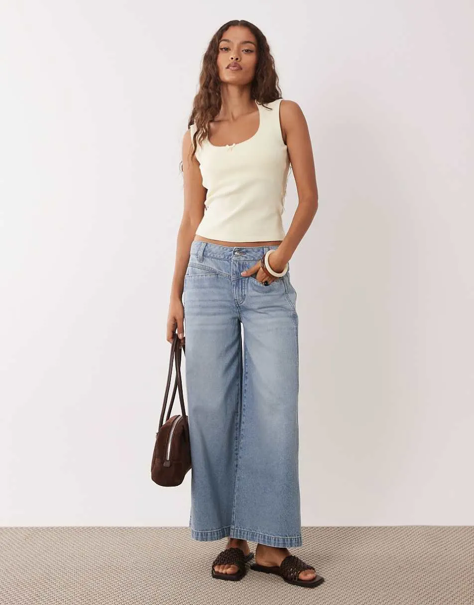 ASOS DESIGN Petite ankle grazer wide leg jeans with front pocket in light wash