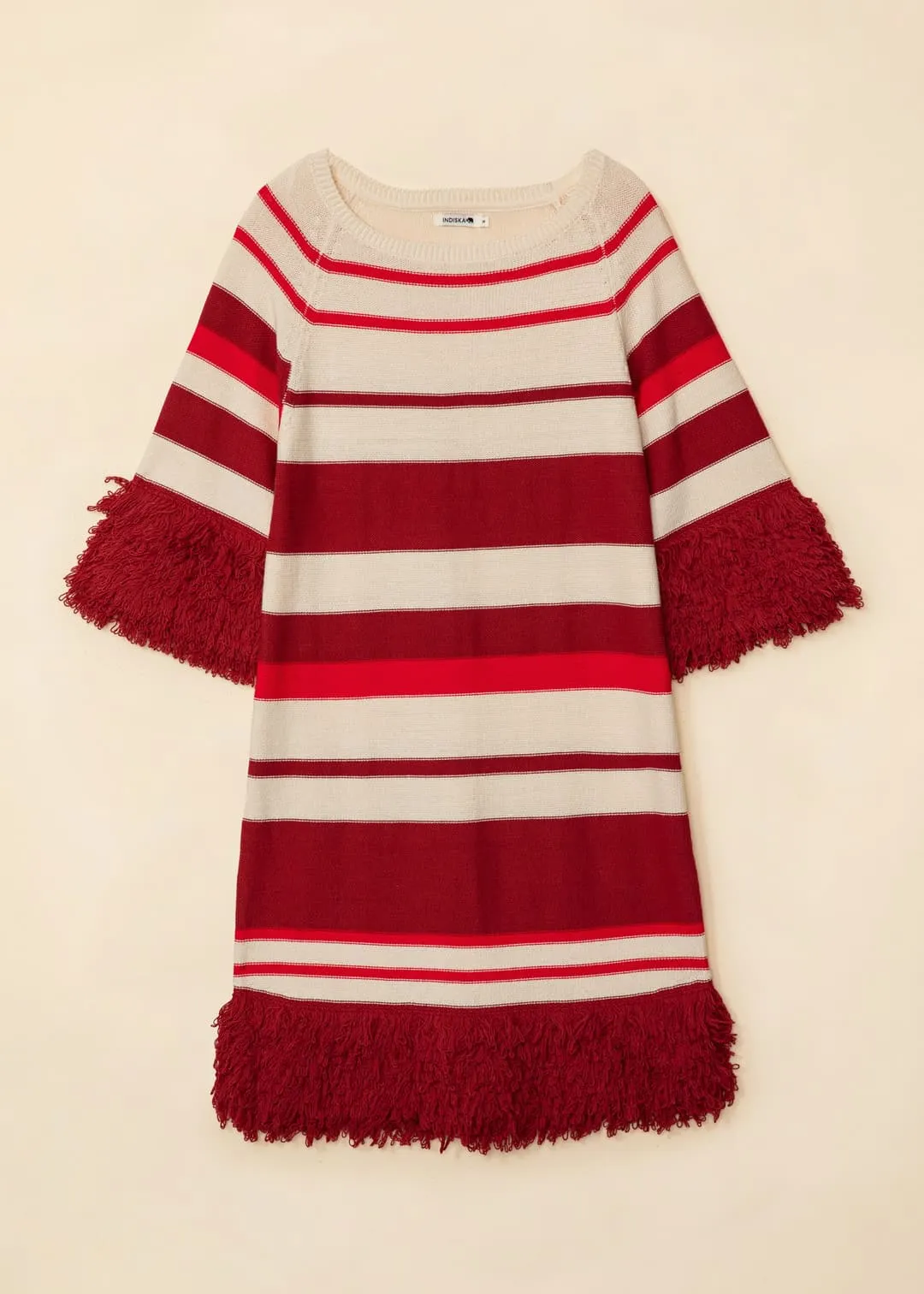 Stickad klänning med fransar