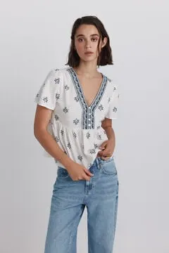 Camisa peplum detalles escote