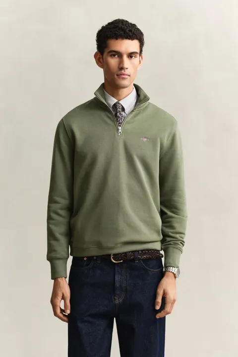 Shield collegegenser med half-zip