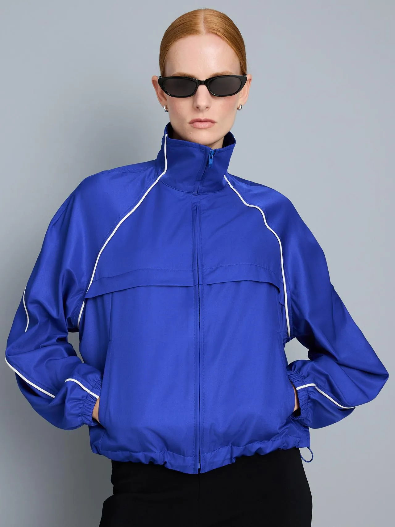 Veste de sport légère à passepoil contrasté