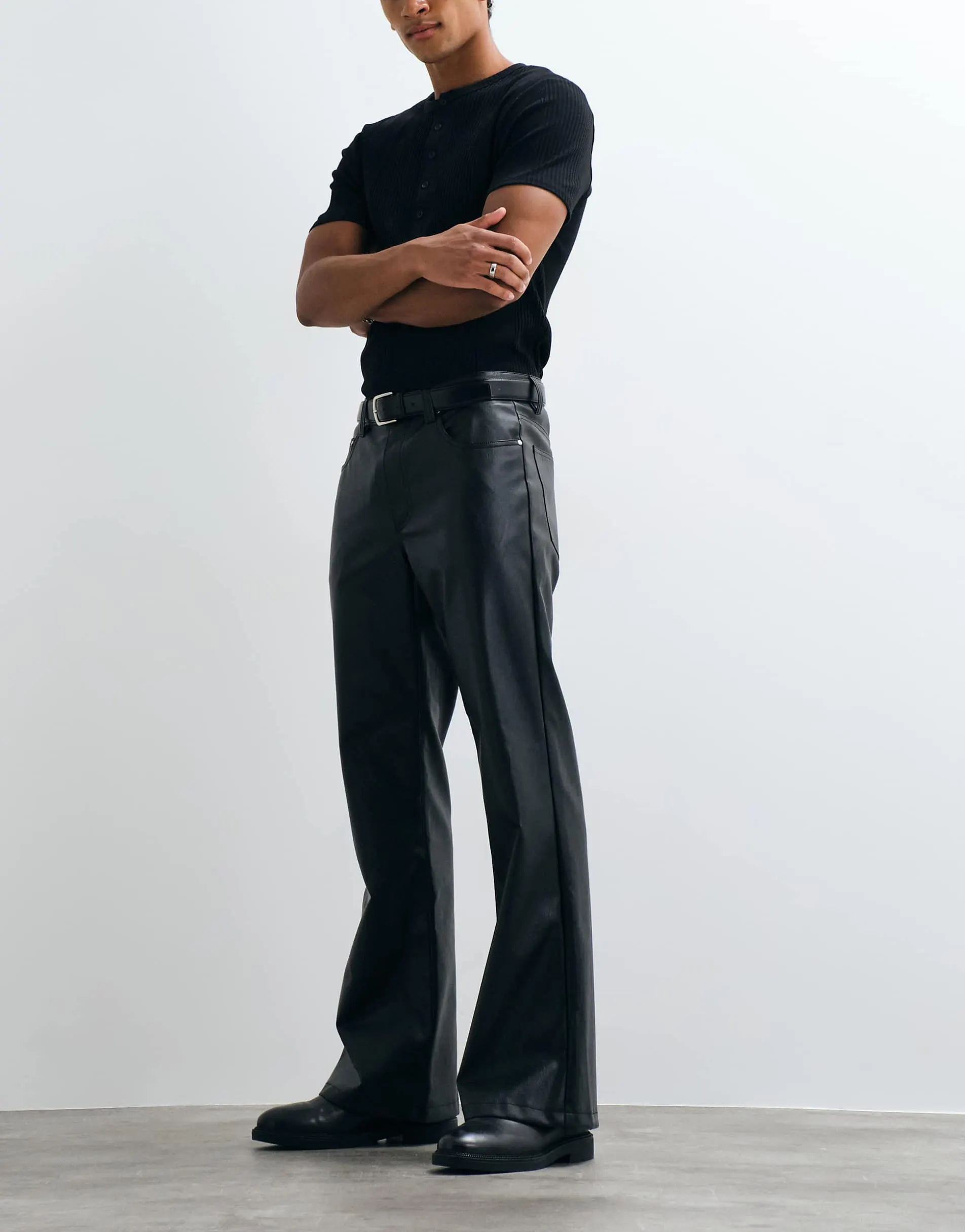ASOS DESIGN wide flare trousers in black faux leather