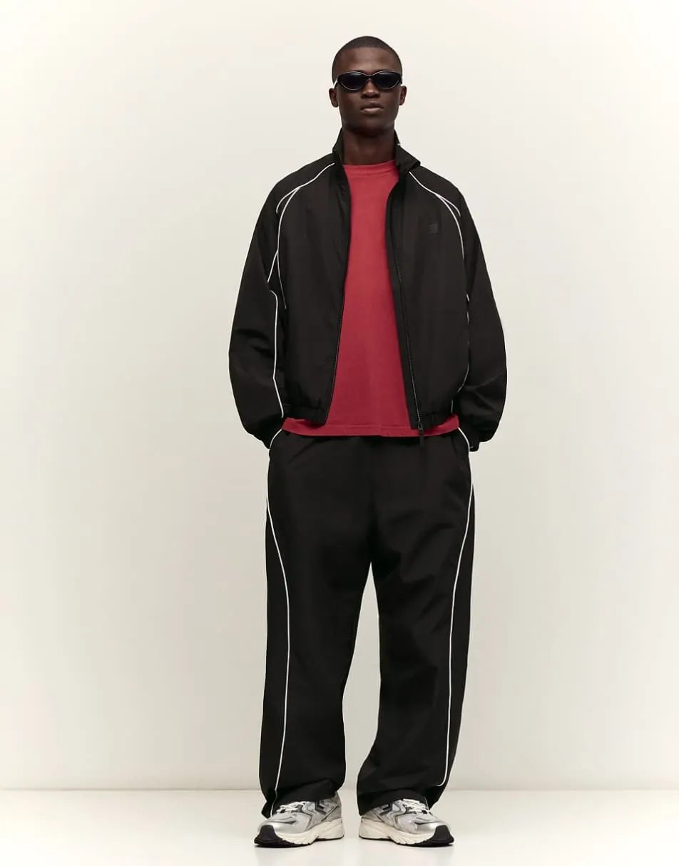 Bershka Technical baggy trousers in black