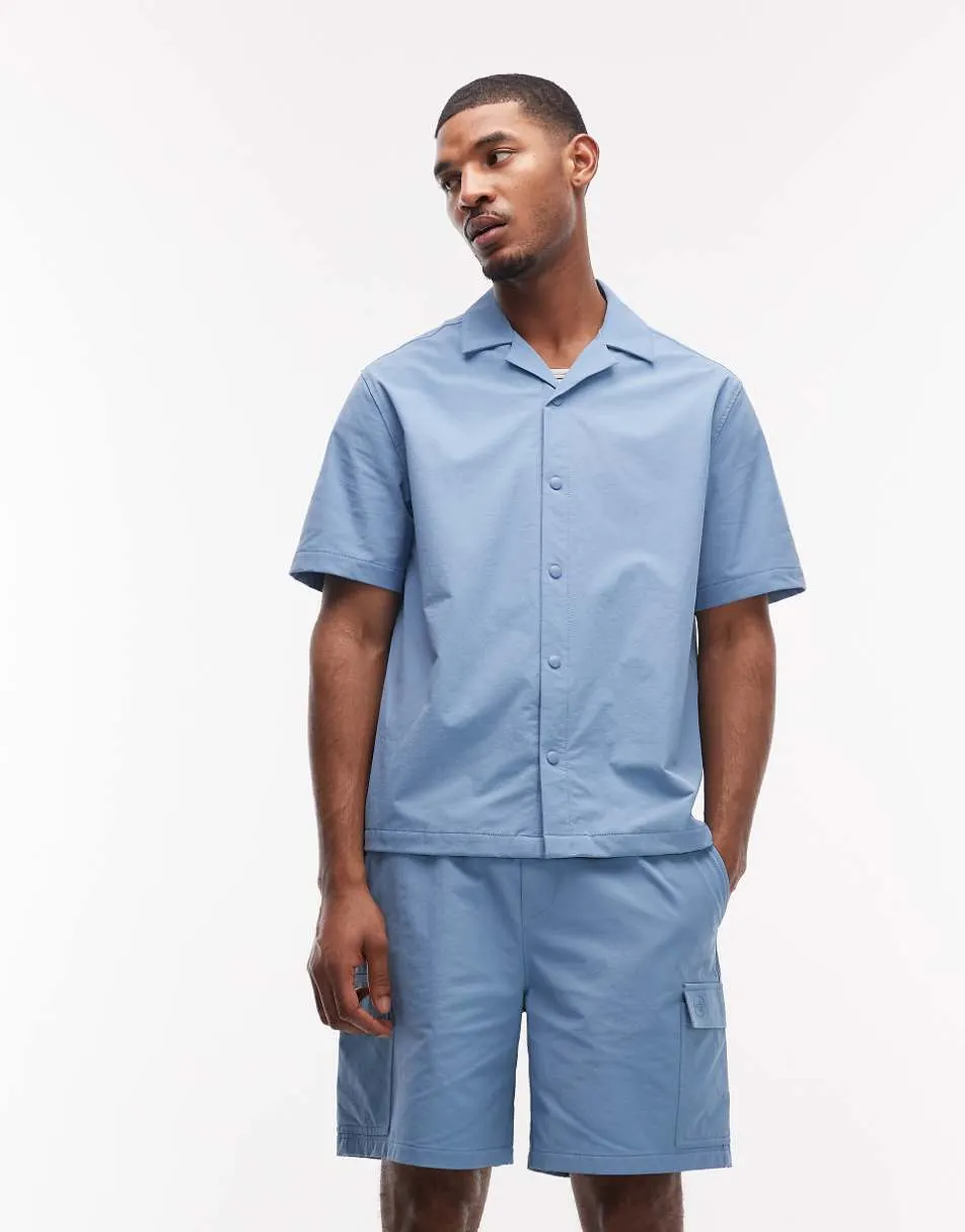 ASOS DESIGN motionMAX™ relaxed fit four way stretch shirt in blue