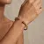 Armband in edelstaal, gedraaid met bollen