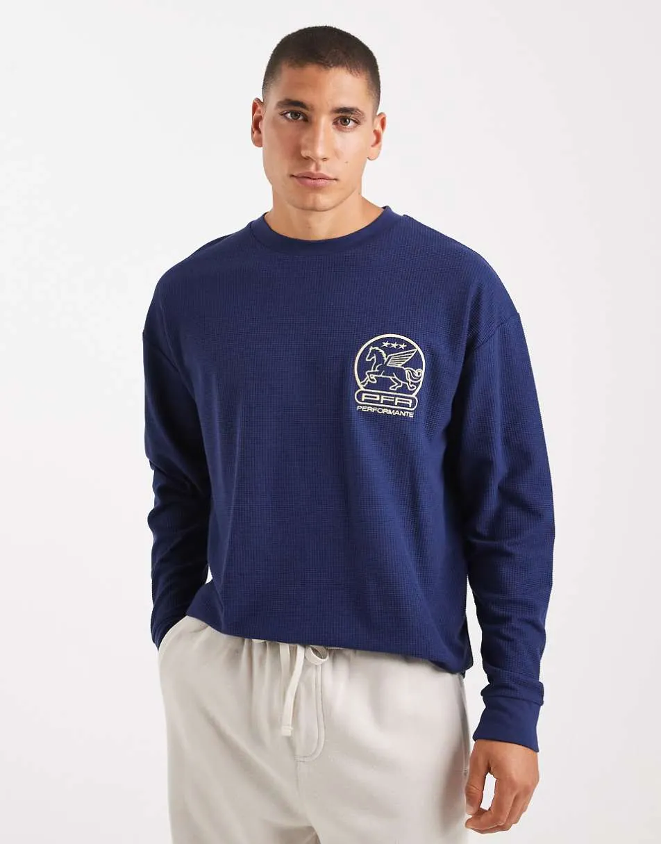 ASOS DESIGN relaxed long sleeve t-shirt with chest embroidery in navy waffle texture