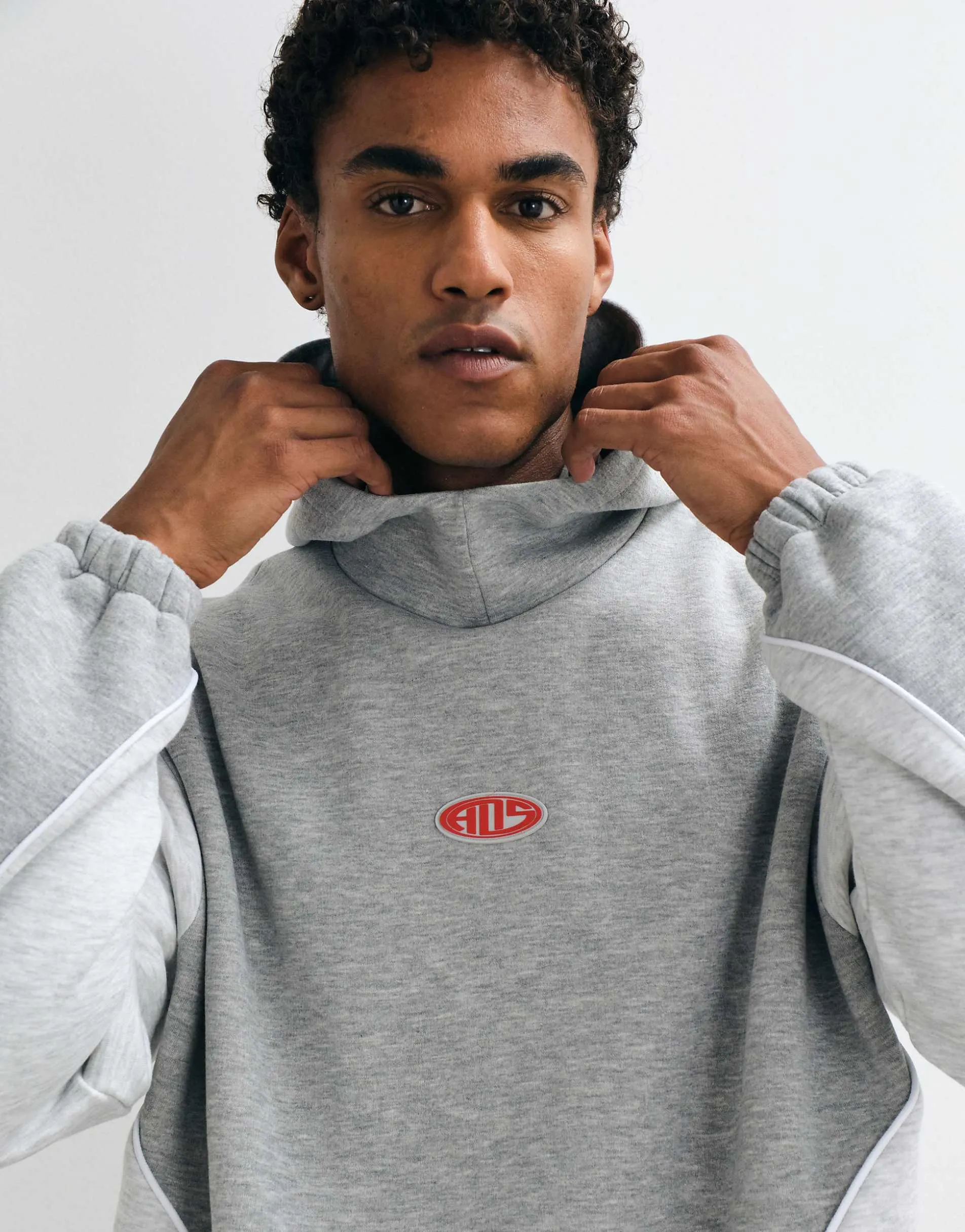 ASOS DESIGN oversized funnel hood with piping, cut and sew and rubber patch in grey marl