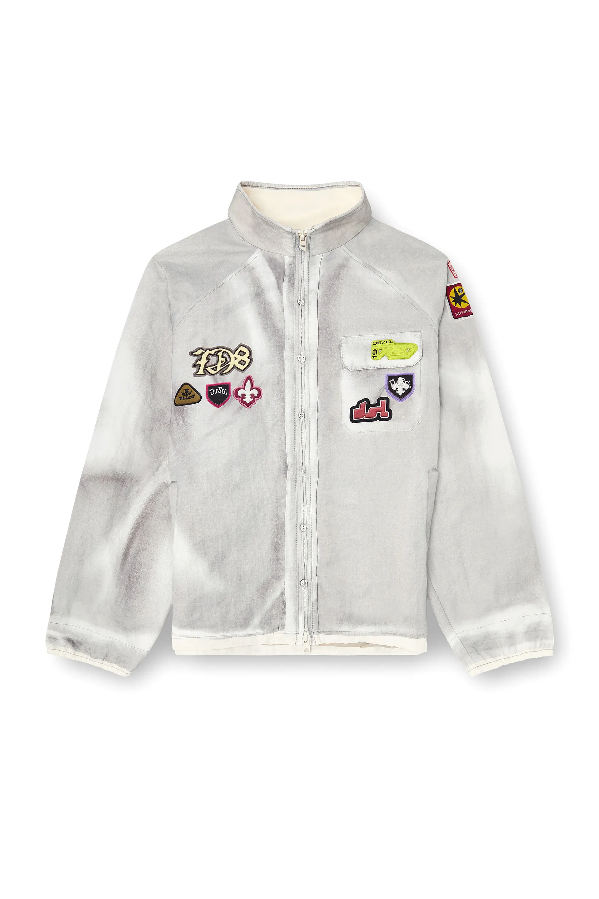 Windbreaker with trompe l’oeil patches