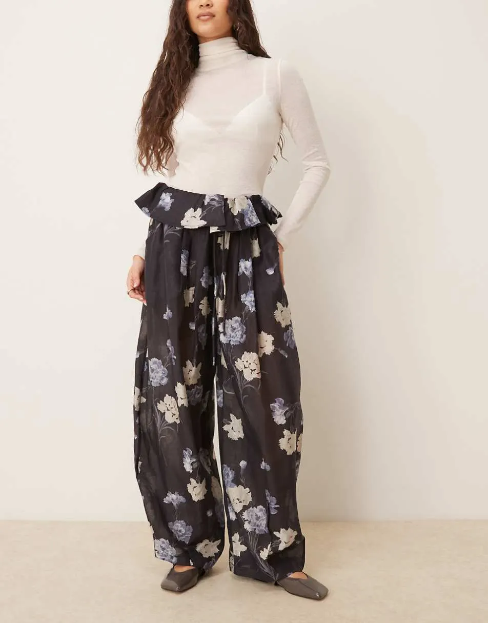 ASOS DESIGN floating trousers in floral in black
