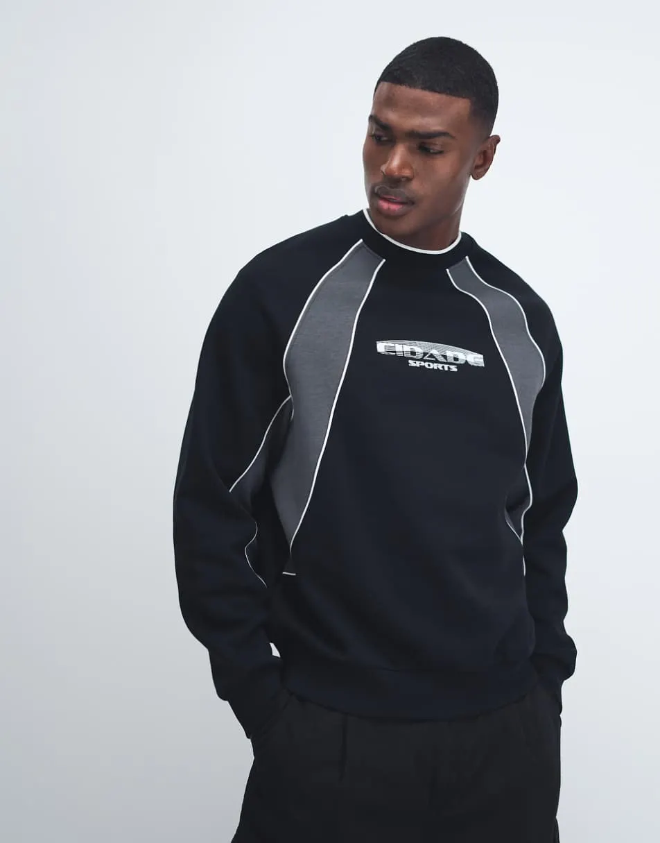 ASOS DESIGN relaxed printed sweatshirt with cut & sew panels in black